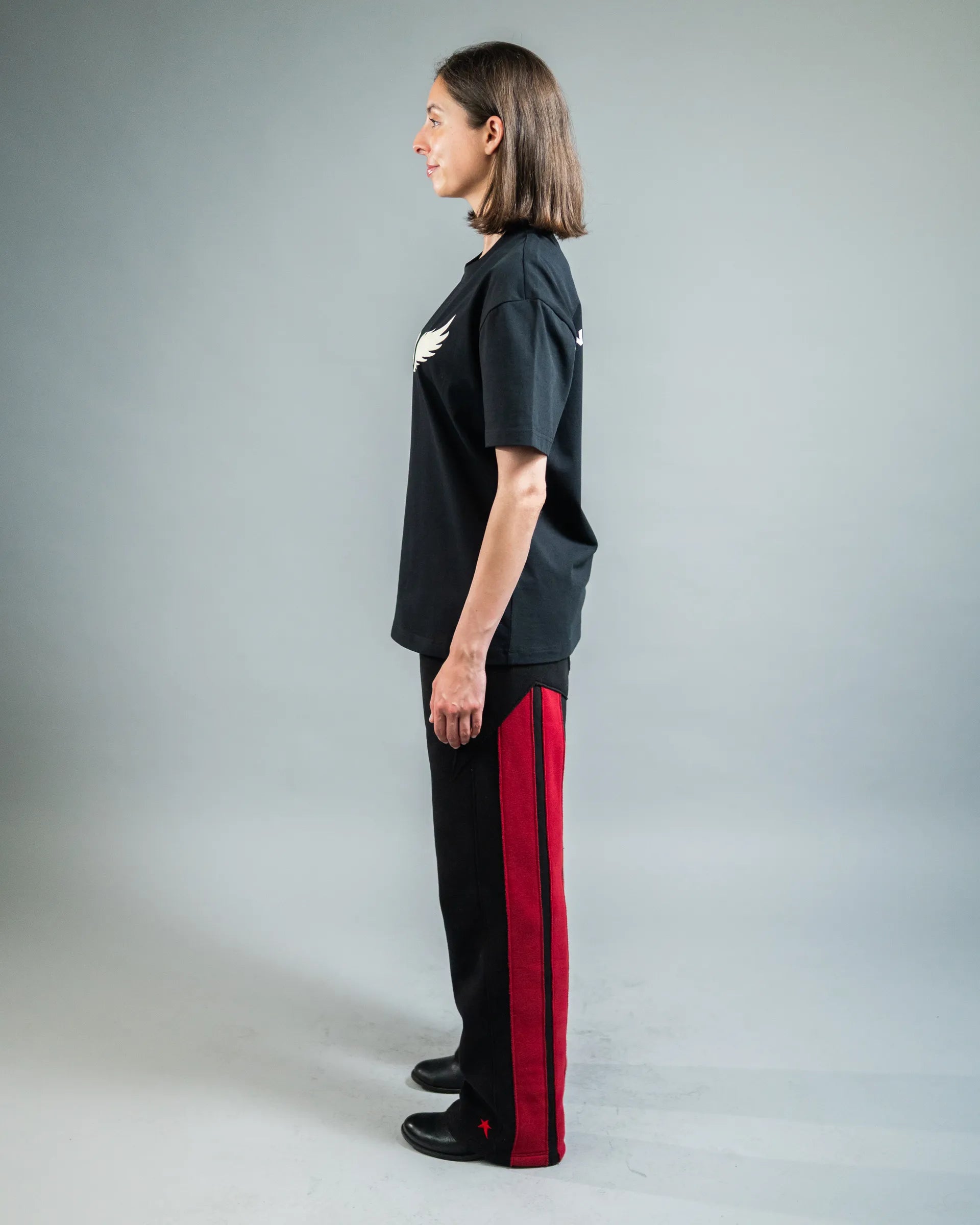 Barth Fleece Pant — Black w/ Red — hero — Andrew Charles SS26