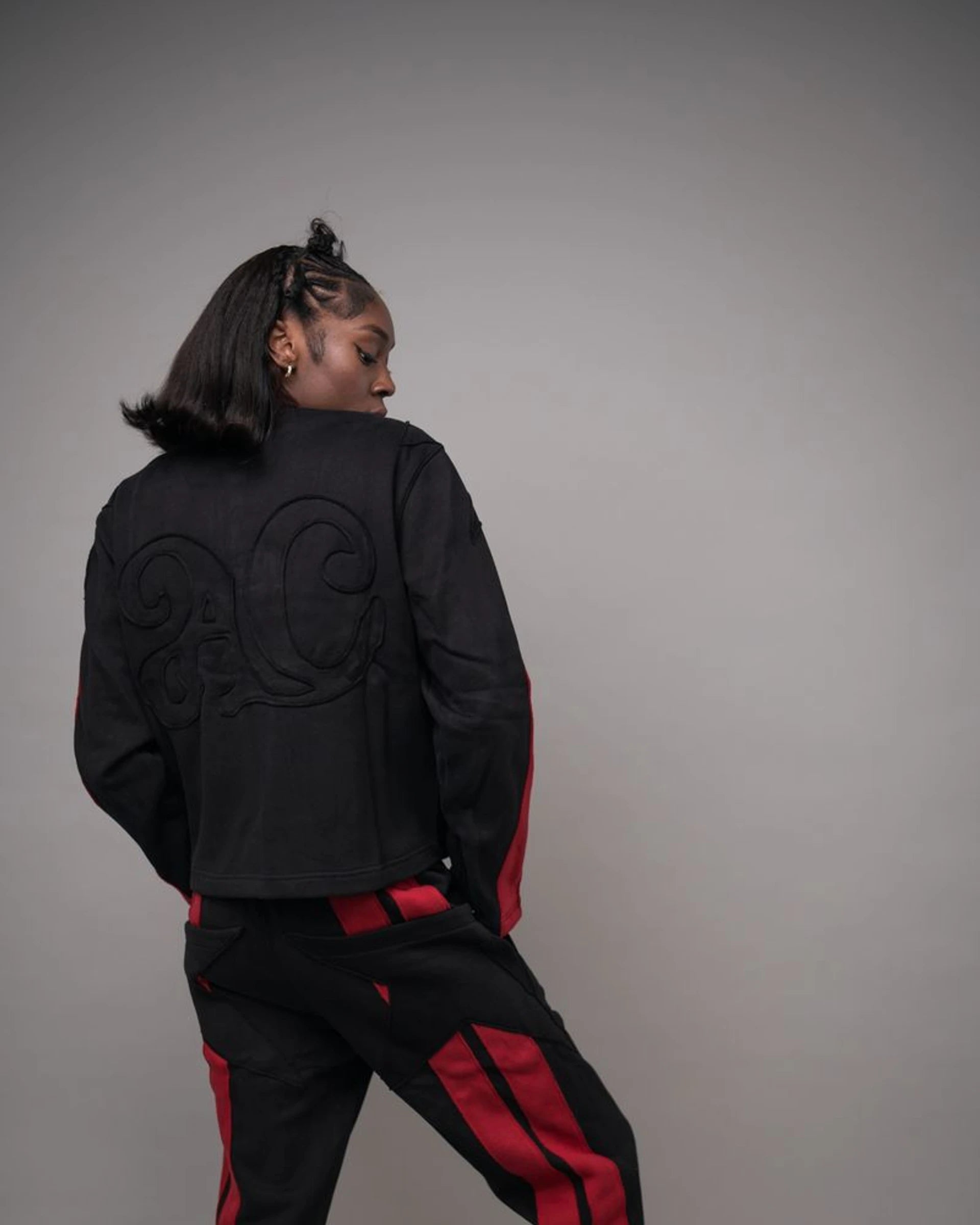 Pieced Zip Front Jacket — Black/Red — hero — Andrew Charles SS26