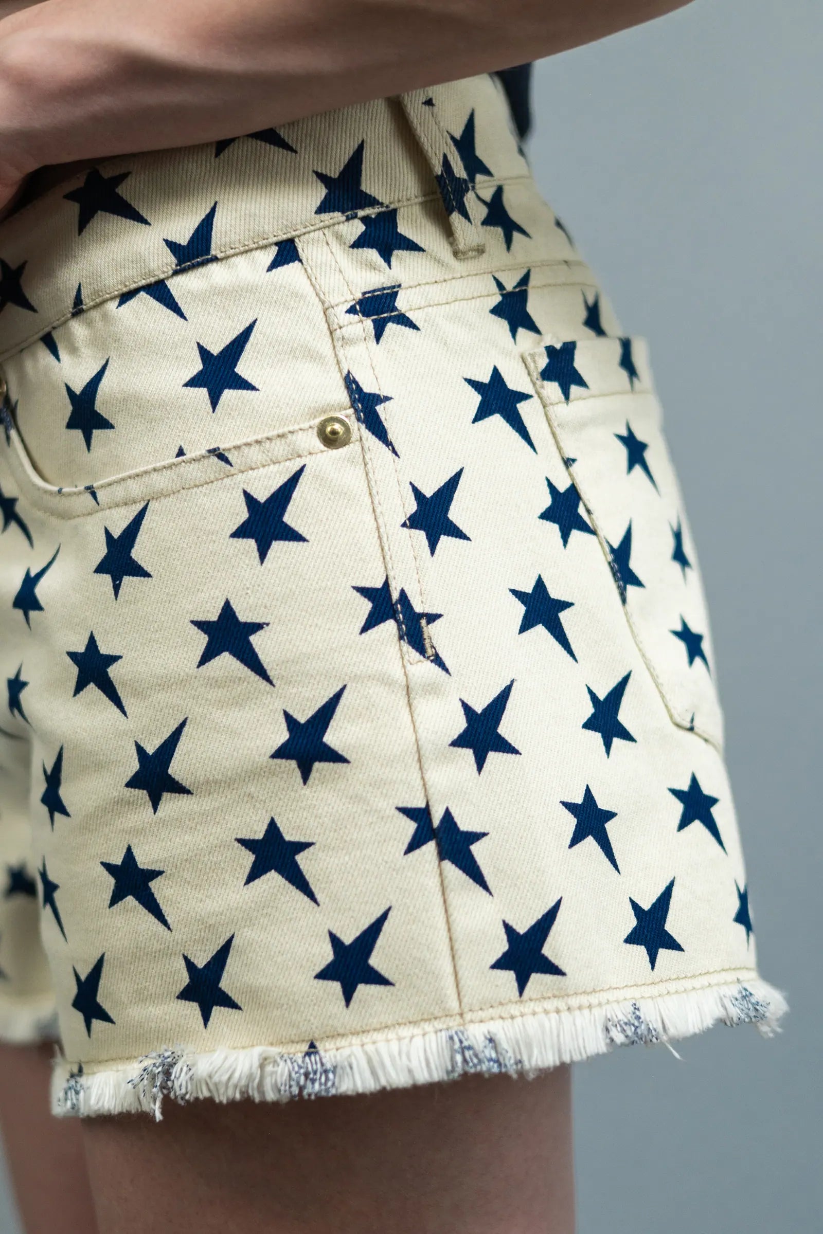 Star Denim Shorts — Off-White — studio back — Andrew Charles SS26