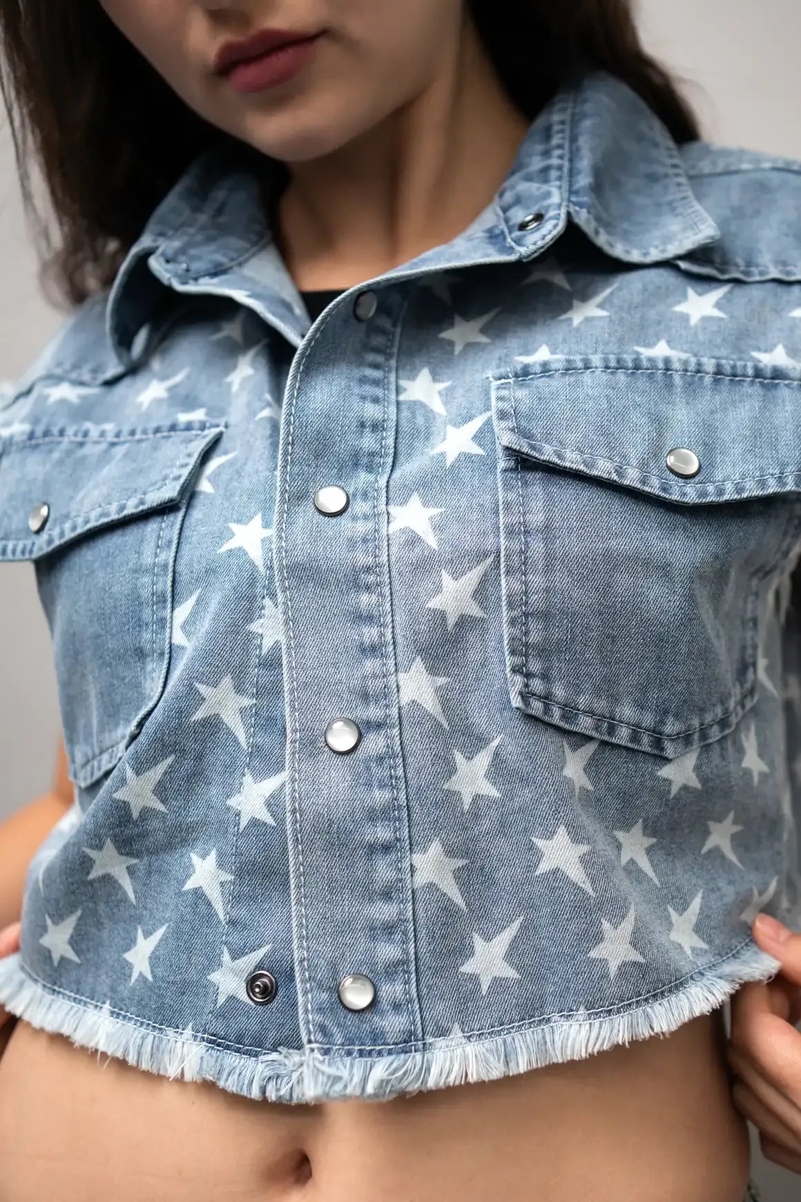 Star Print Denim Vest — Blue Wash — front detail — snap placket, frayed hem — Andrew Charles SS26